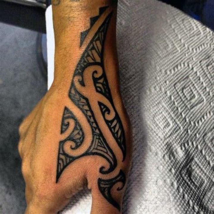 Tribal Tattoo on Hand for Men: A Bold Statement of Style and Culture