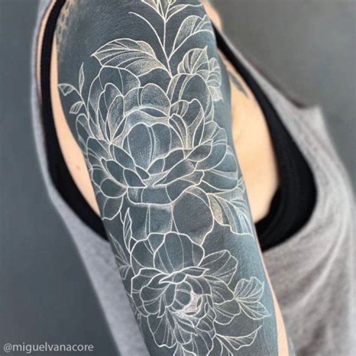 White Ink Over Black Ink Tattoo Cover Up: A Comprehensive Guide